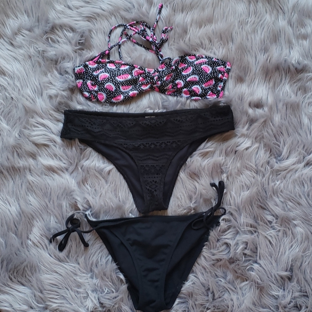 Two bathing suit bottoms one top